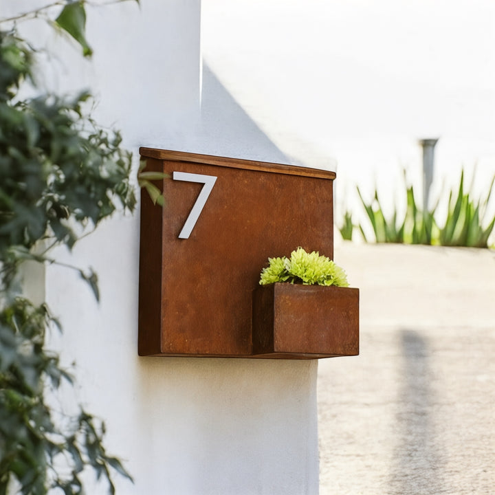 Corten wall-mounted letterbox with planter